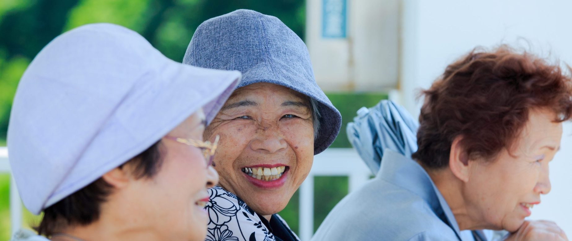 Photograph of 3 senior women smiling